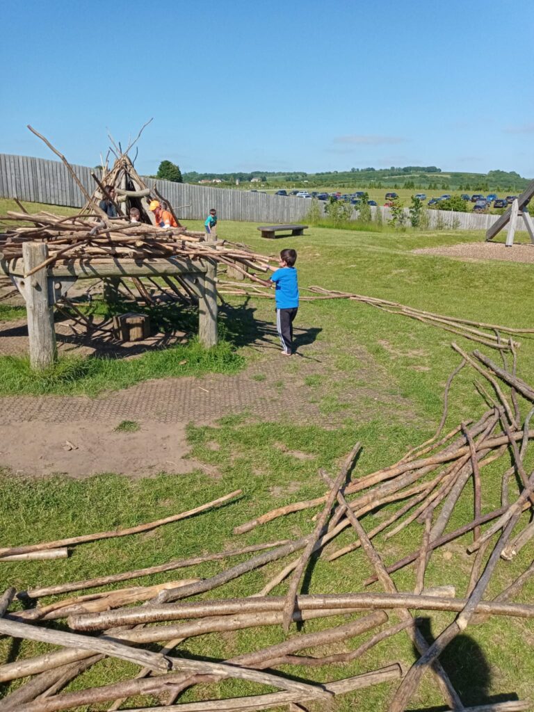 Boy enjoying den building at Williams Den